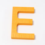 Grimm's wooden school Letter E in a shade of YELLOW. These Grimm's letters are part of a wide range of wooden toys available here at Babipur. 