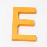 Grimm's wooden school Letter E in a shade of YELLOW. These Grimm's letters are part of a wide range of wooden toys available here at Babipur. 