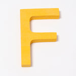 Grimm's wooden school Letter F in a shade of YELLOW. These Grimm's letters are part of a wide range of wooden toys available here at Babipur. 