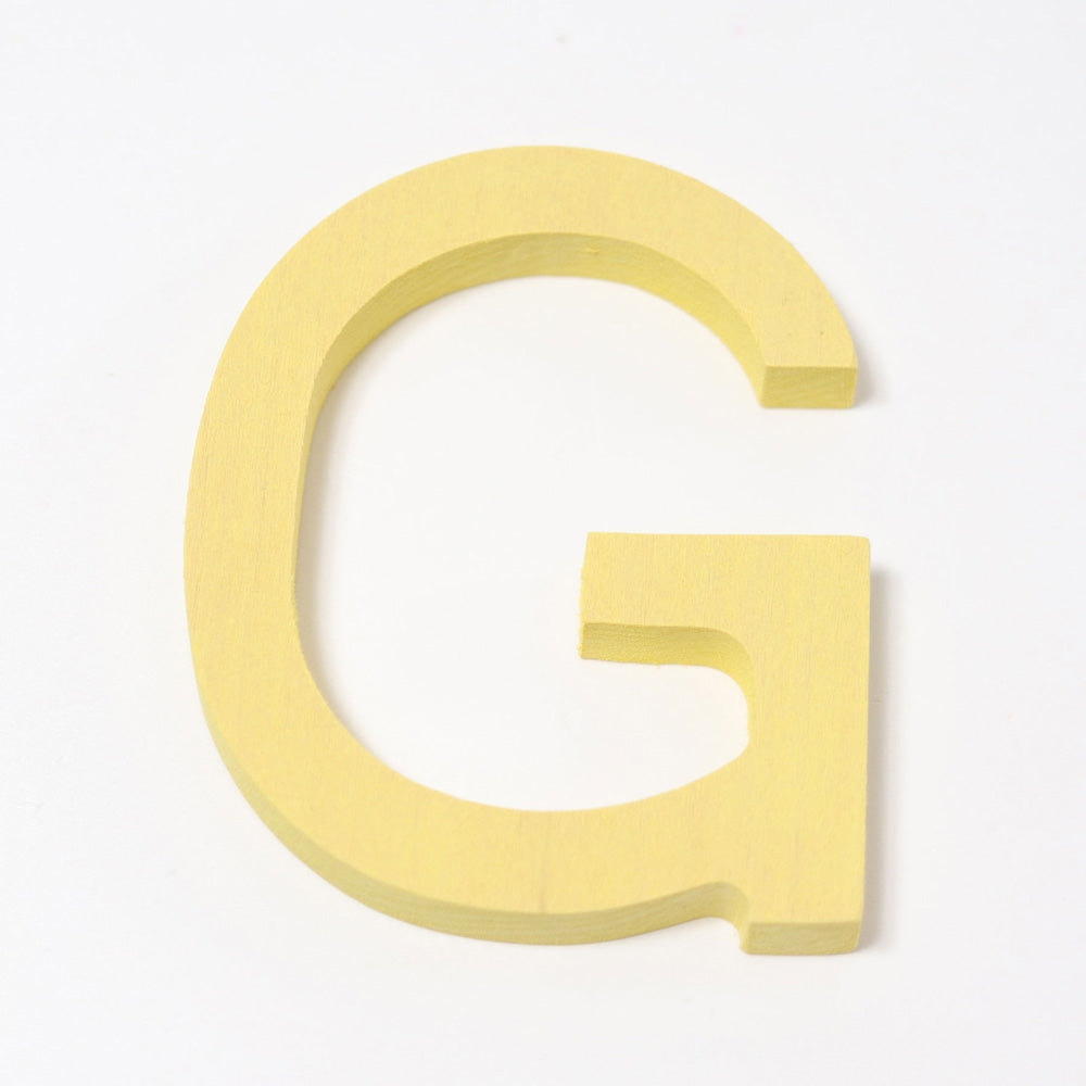 Grimm's wooden school Letter G in a shade of YELLOW. These Grimm's letters are part of a wide range of wooden toys available here at Babipur. 