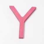 Grimm's wooden school Letter Y in a shade of PINK. These Grimm's letters are part of a wide range of wooden toys available here at Babipur. 