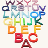 Grimm's wooden school Letters in rainbow colours. Perfect for use as an educational tool and for adding to seasonal displays.  