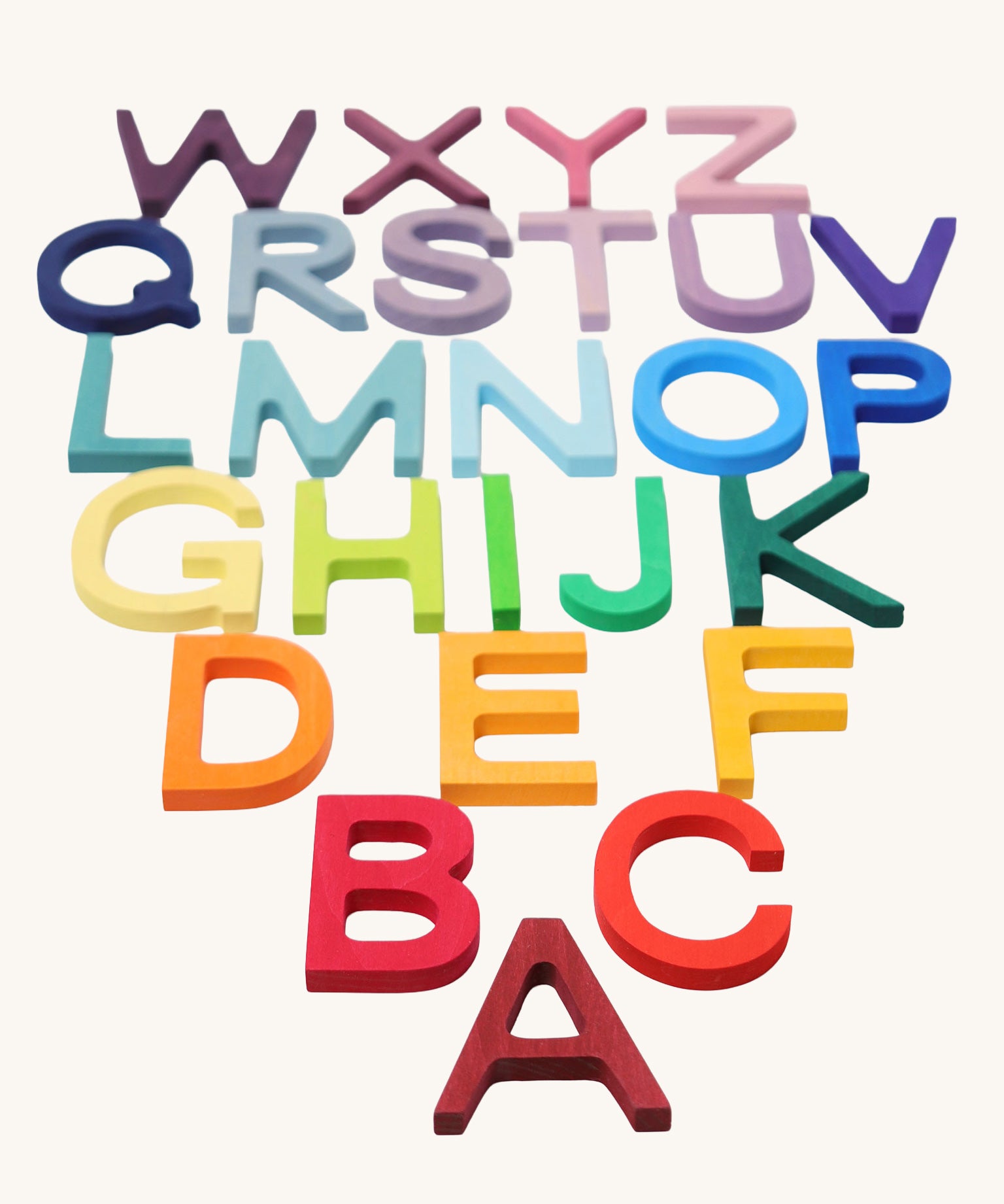 Grimm's wooden school Letters in rainbow colours. Perfect for use as an educational tool and for adding to seasonal displays.  