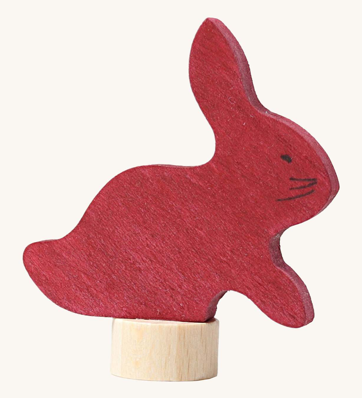 Grimms wooden sitting rabbit decorative figure in dark red. Features a small base stand to slot in the celebration ring