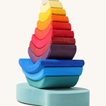 Grimm's Stacking Tower Boat toy shown at an angle.