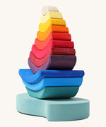 Grimm's Stacking Tower Boat toy shown at an angle.