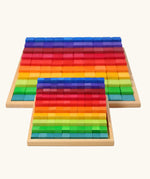 Grimm's small stepped counting blocks in a tray placed in front of the large version.