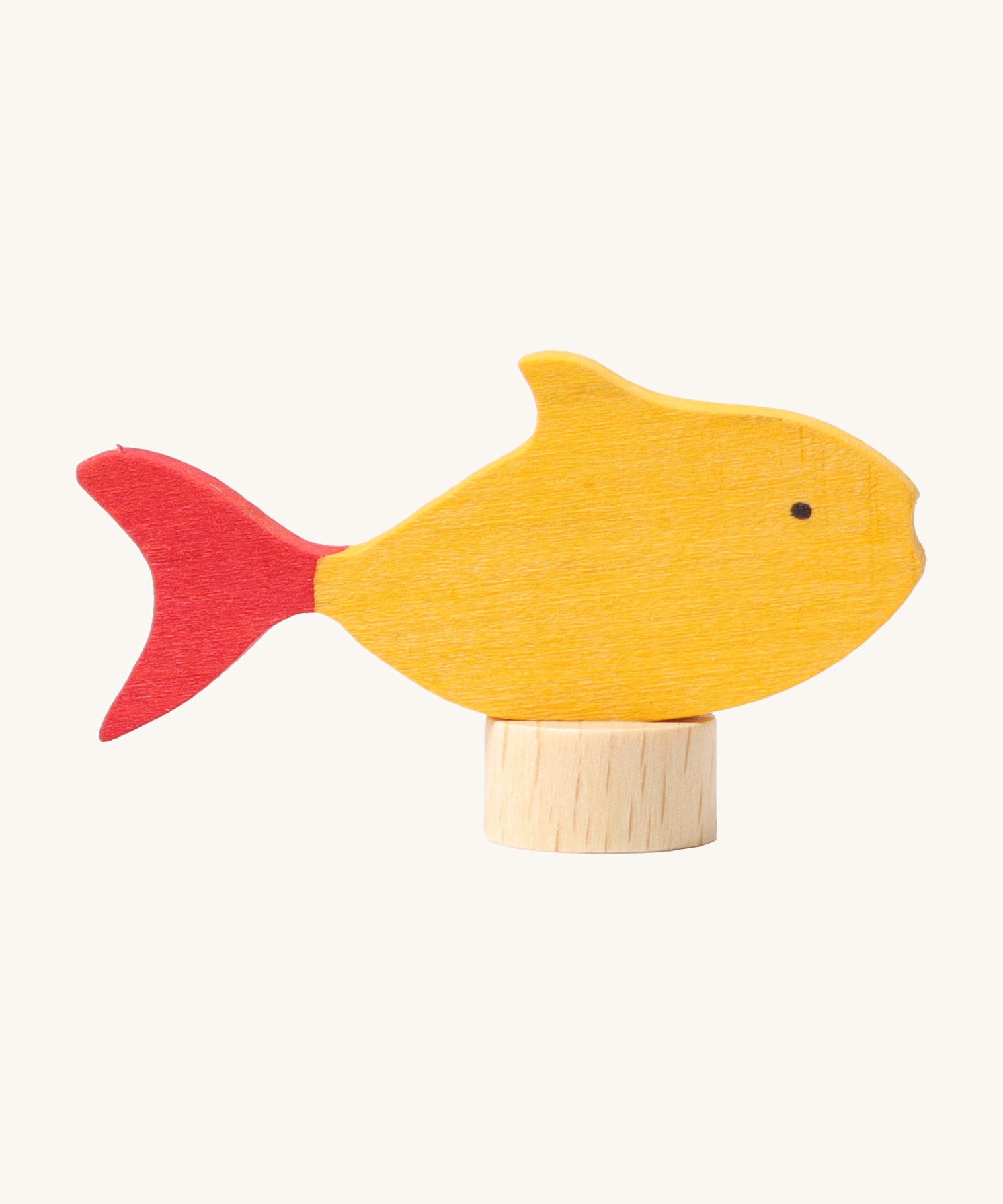 Grimms wooden yellow fish decorative figure with red fins. Features a small base stand to slot in the celebration ring.