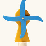Grimm's handcrafted wooden yellow working windmill with a unpainted stand