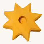 Grimm's Yellow Lifelight Star decorative figure holder on a plain background.