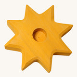 Grimm's Yellow Lifelight Star decorative figure holder on a plain background.