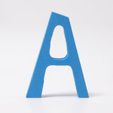 Grimm's Anthroposophical style wooden Letter A in a shade of blue. These Grimm's letters are part of a wide range of wooden toys available here at Babipur. 