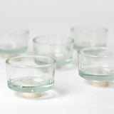 Empty Grimm's glass tealight holders