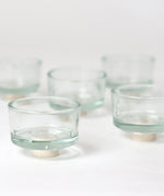 Empty Grimm's glass tealight holders