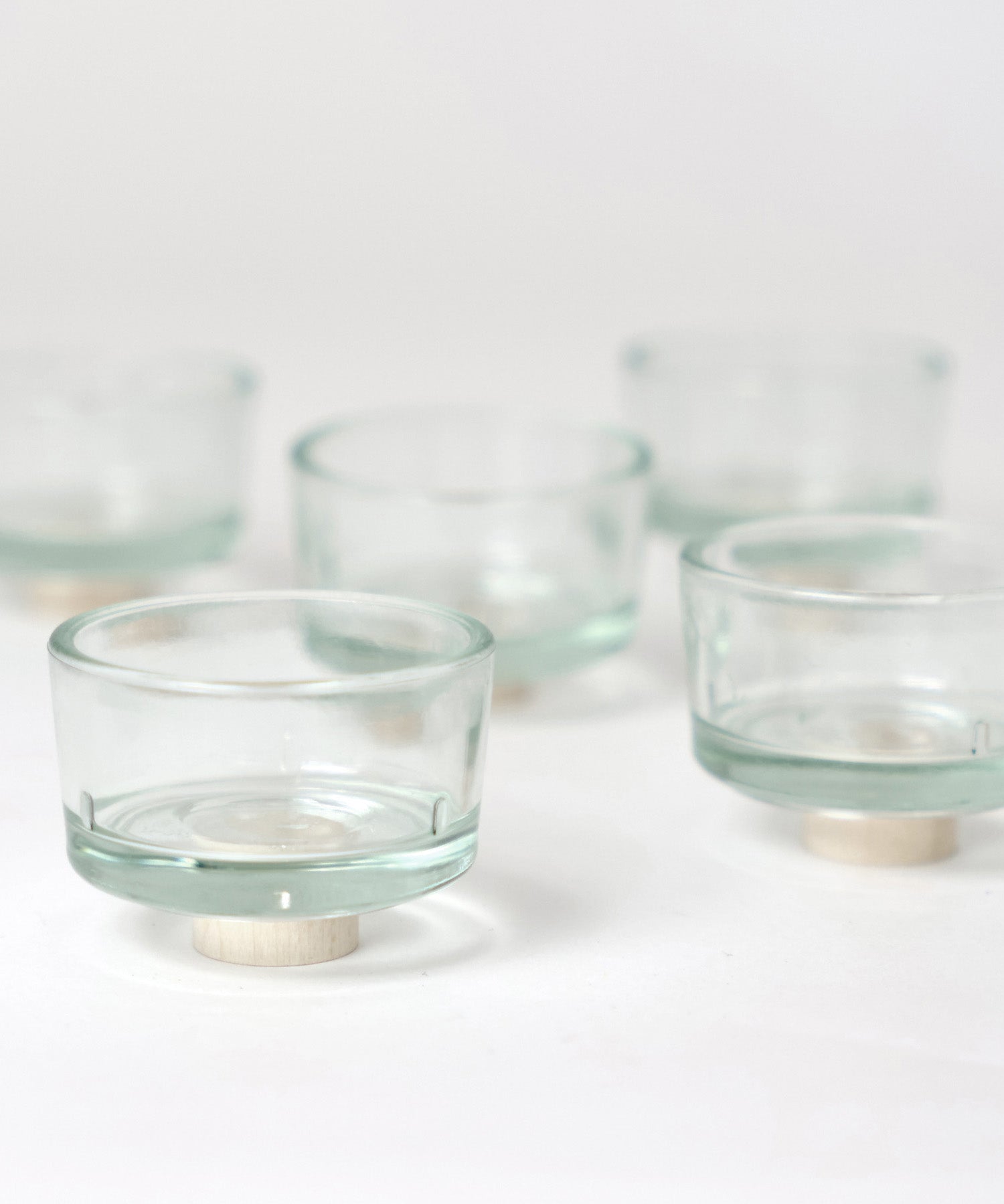 Empty Grimm's glass tealight holders