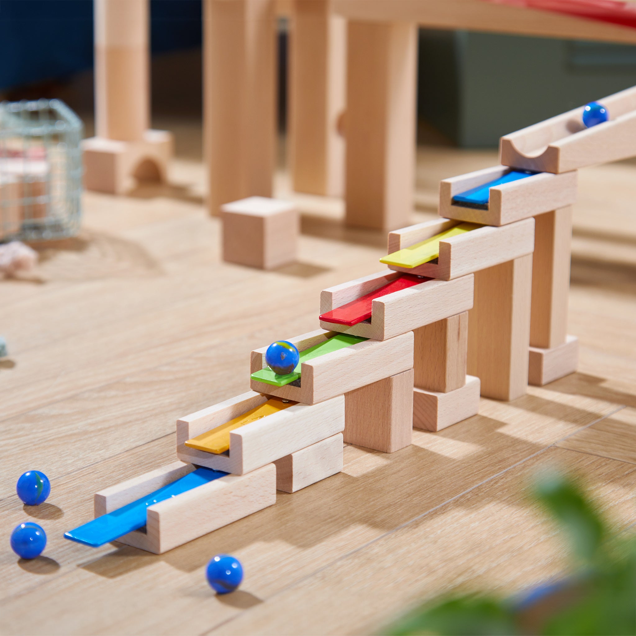 A view of each block and marble in the HABA Wooden Melodious Marble Run set