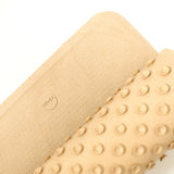 Close up of the texture on the Hevea natural rubber beige shower mat