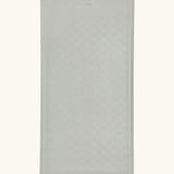 Hevea large natural rubber bath mat in Granite, a light grey, with wave pattern for non-slip.