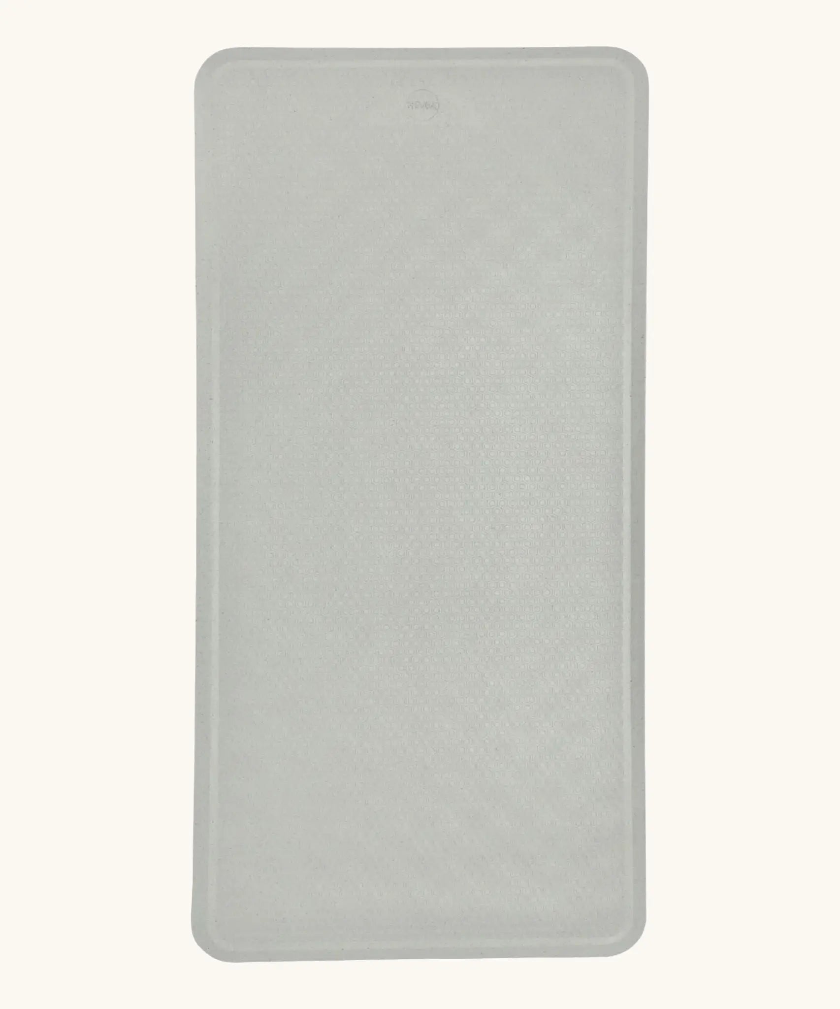 Hevea large natural rubber bath mat in Granite, a light grey, with wave pattern for non-slip.
