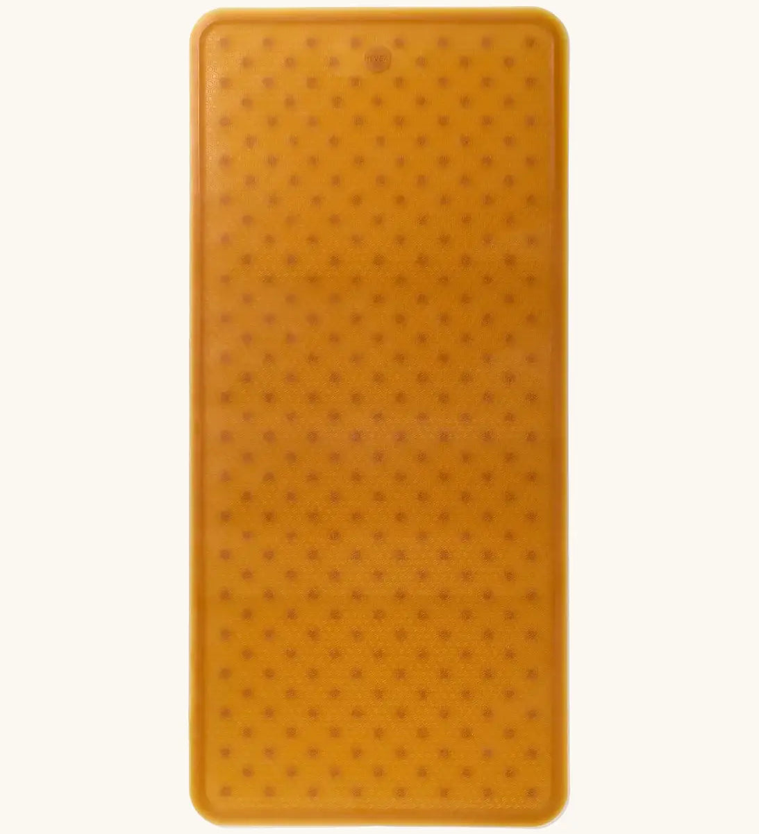 Hevea large natural rubber bath mat in natural orange, with wave pattern for non-slip.