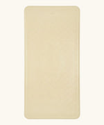 Hevea large natural rubber bath mat in Sand, a light beige, with wave pattern for non-slip.