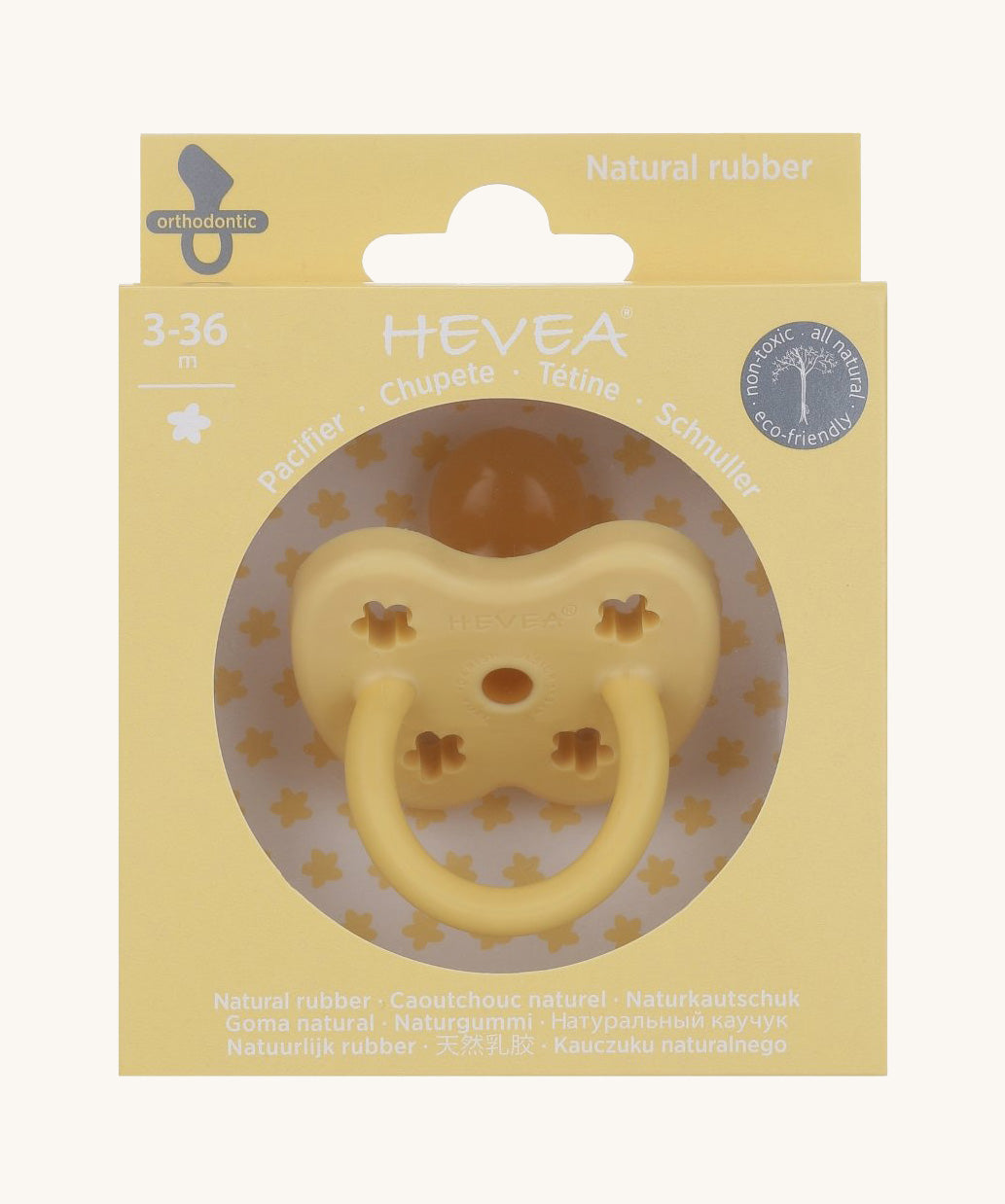 The Hevea 100% natural rubber baby pacifier with an orthodontic teat in its eco friendly box - banana yellow
