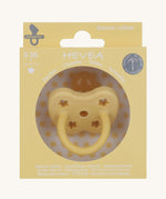 The Hevea 100% natural rubber baby pacifier with an orthodontic teat in its eco friendly box - banana yellow