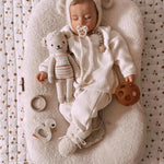 A sleeping baby with a Hevea natural rubber pacifier dummy from Hevea