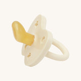 The Hevea 100% natural rubber baby pacifier with an orthodontic teat - milky white