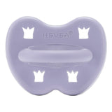 Hevea Orthodontic dusty violet chemical-free pacifier with crown cut outs on a white background