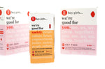 Close up of the Hey Girls non applicator tampons box next to some Hey Girls day pads on a white background