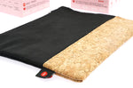 Close up of the Hey Girls reusable cork dry bag laid on a white background