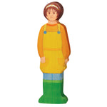 Wooden toy figure of an adult female farmer.