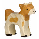 The Holztiger Goatling wooden figure is a Waldorf wooden goat kid with brown and white fur, smart black hooves and little horn buds.