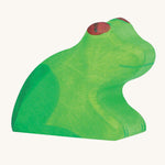 The Holztiger wooden toy frog figure on a plain background. 