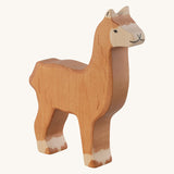 The Holztiger Alpaca wooden animal toy. A hand carved and painted toy for encouraging imaginative and Waldorf-inspired play. 