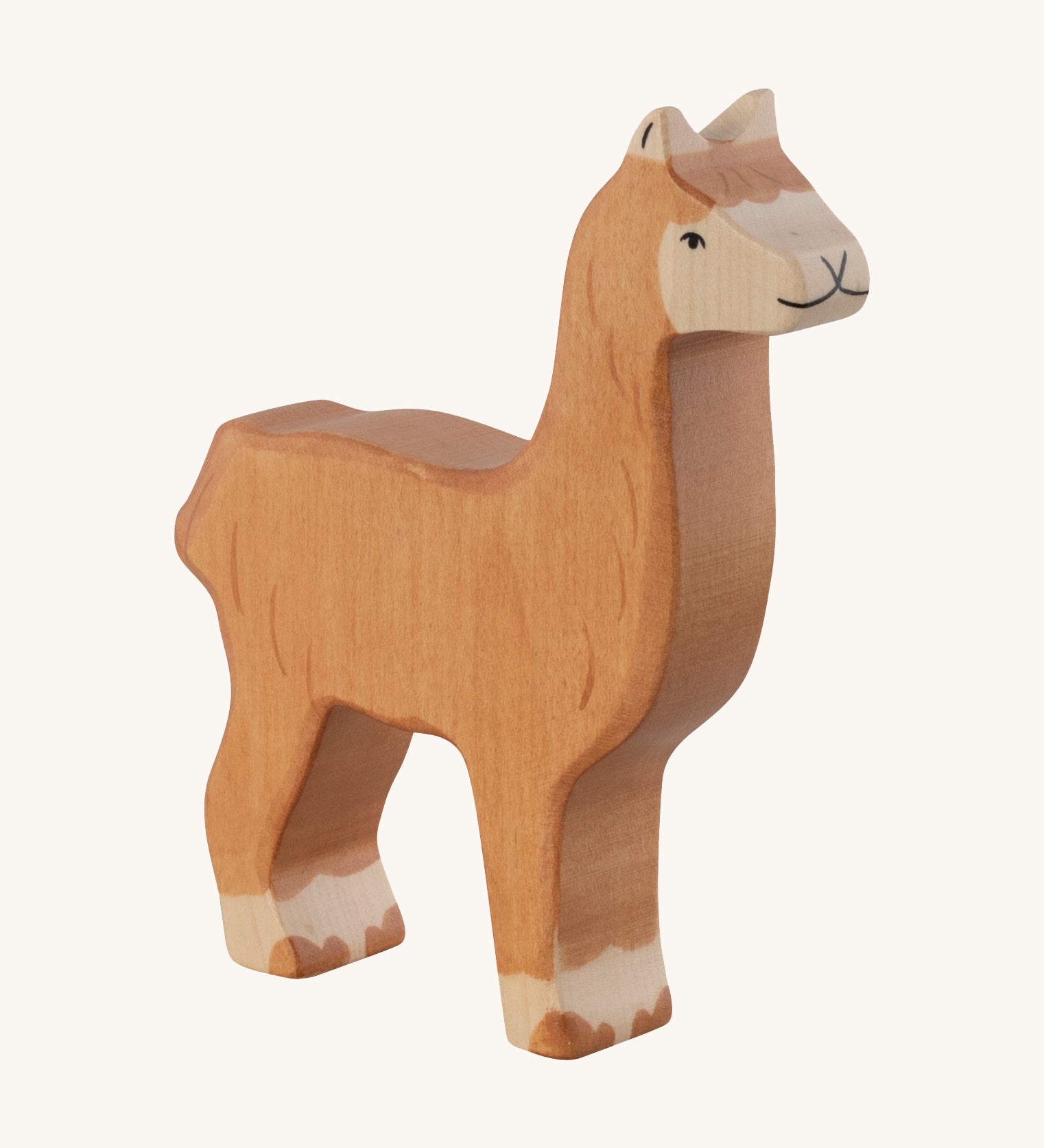 The Holztiger Alpaca wooden animal toy. A hand carved and painted toy for encouraging imaginative and Waldorf-inspired play. 