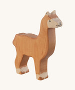 The Holztiger Alpaca wooden animal toy. A hand carved and painted toy for encouraging imaginative and Waldorf-inspired play. 