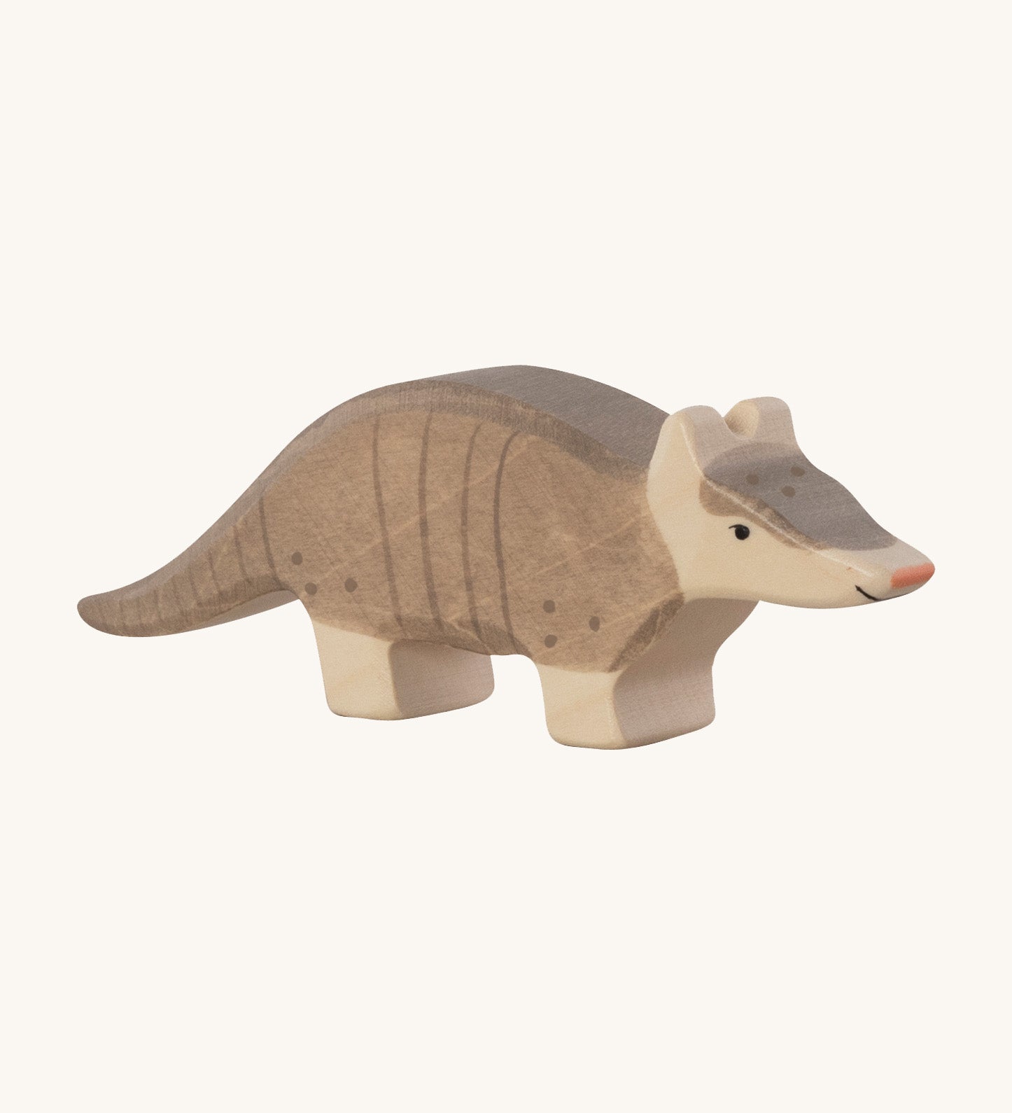 The Holztiger Armadillo wooden animal toy. A hand carved and painted toy for encouraging imaginative and Waldorf-inspired play. 