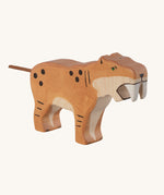 The Holztiger Saber-Toothed Tiger wooden animal toy. A hand carved and painted toy for encouraging imaginative and Waldorf-inspired play. 