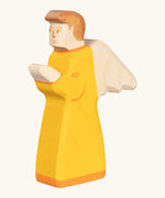 Holztiger handcrafted wooden angel figure with orange gown and brown hair