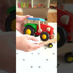 The Bajo wooden tractor and Trailer toy