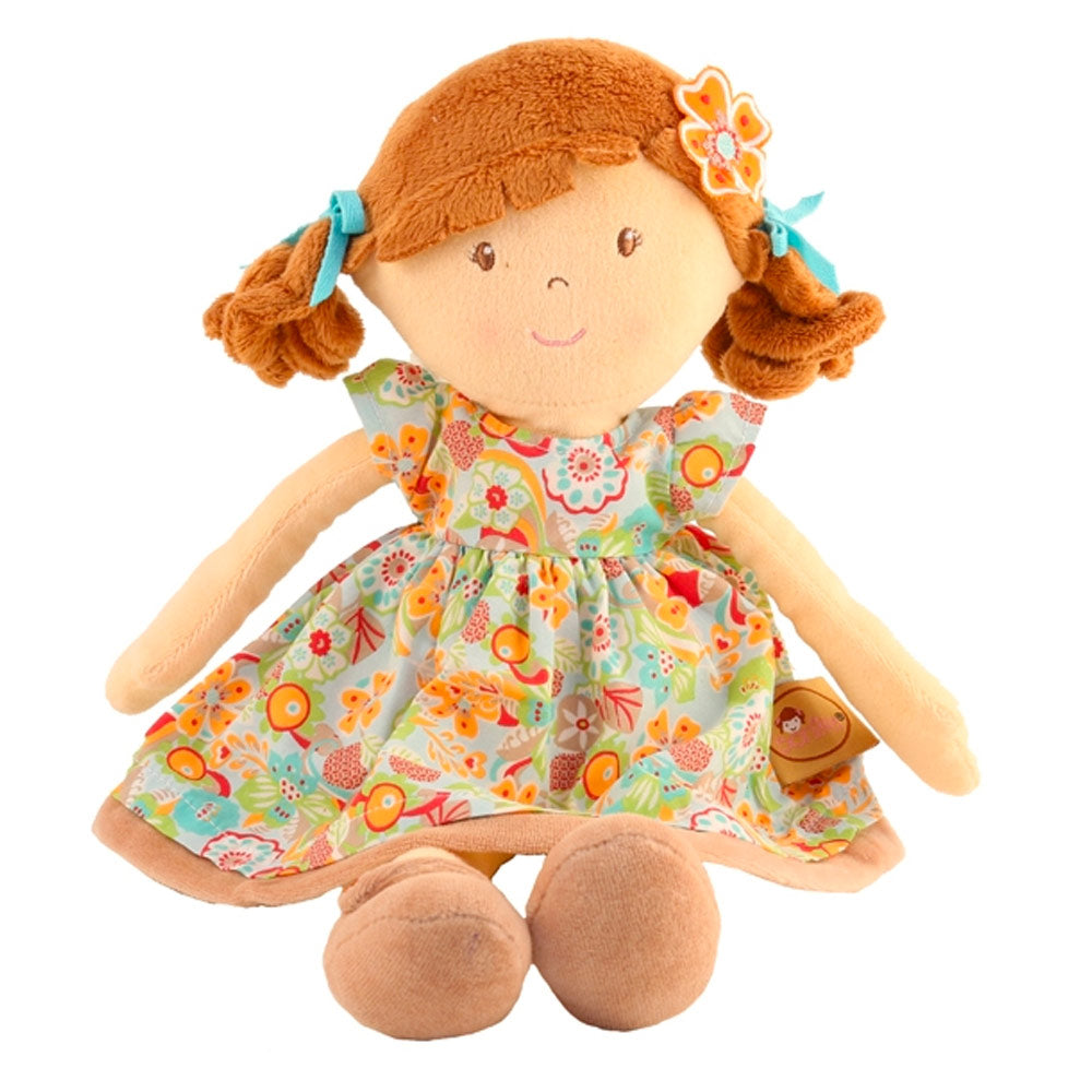 The Bonikka flower kids rag doll in orange is a soft toy doll with warm hair in pig tails and a floral multicoloured dress. sat down with white background.