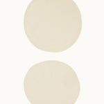 A pair of Imse Merino Wool Breast Warmer Pads pictured on a plain background