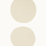 A pair of Imse Merino Wool Breast Warmer Pads pictured on a plain background