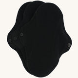 Imse Active reusable Black Organic Cotton Panty Liners in a 3 Pack, pictured on a plain background