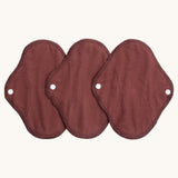 Imse Vimse warm brown panty liner reusable period pads available at Babipur. A 100% organic cotton pad with a white popper fastener