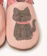 A close up of the Inch Blue meeow soft pink  baby shoes available at Babipur. Showing the grey suede cat cut out design