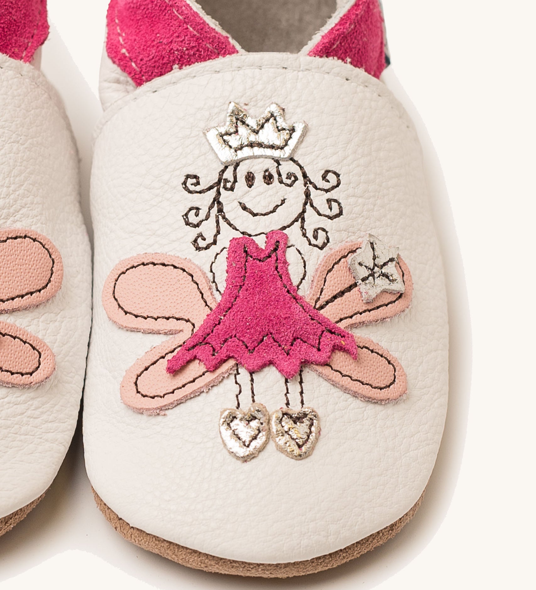 A close up of the Inch Blue fairy princess shoes available at Babipur showing the pink princess fairy design
