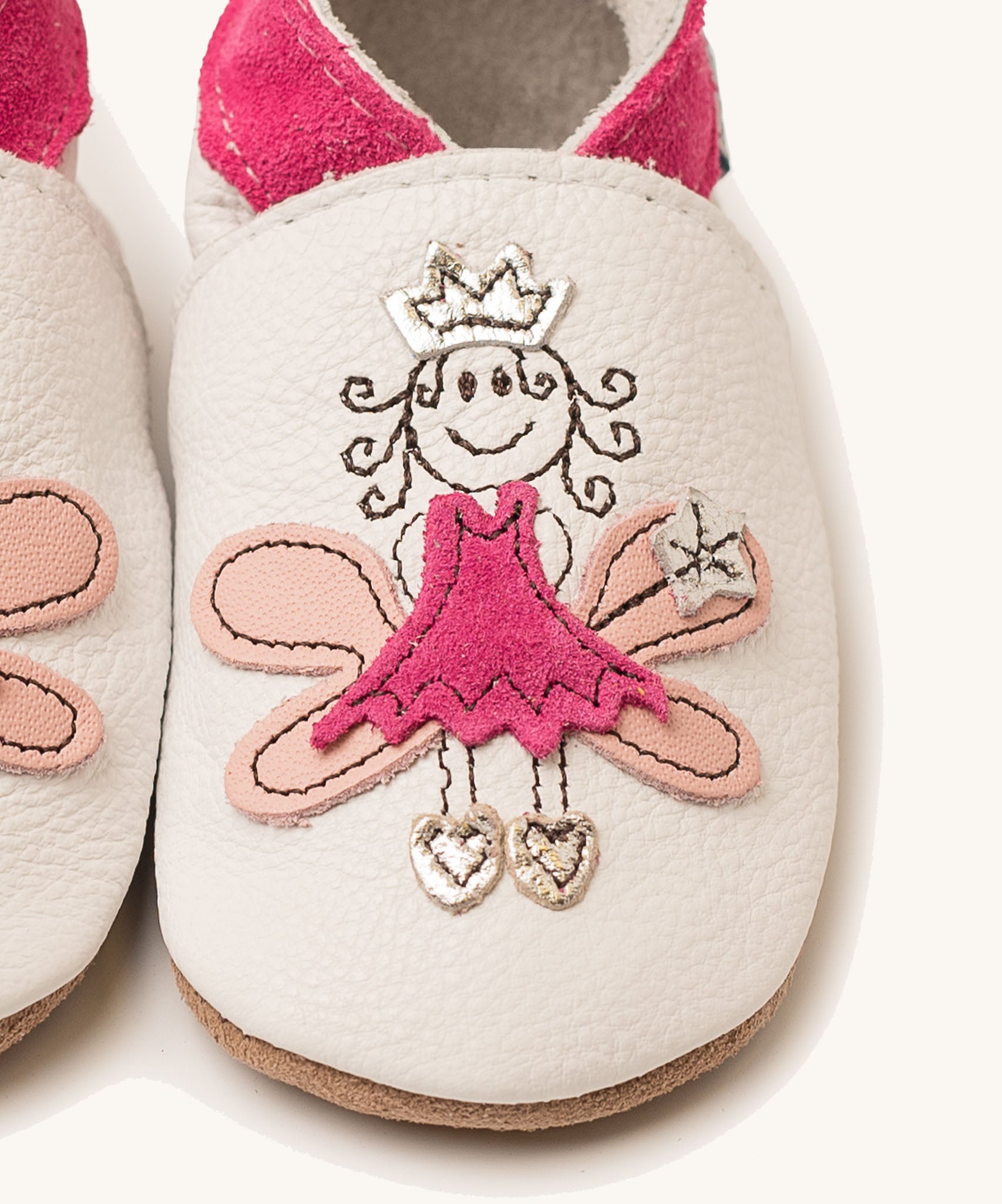 A close up of the Inch Blue fairy princess shoes available at Babipur showing the pink princess fairy design